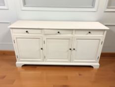 A reproduction painted sideboard fitted cupboards and drawers, 170 cm x 47 cm x 86 cm.