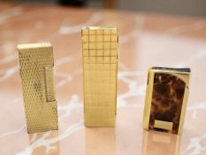 A Dunhill gold-plated lighter,