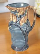 A Carlton Ware Night Oak pattern Art Deco pottery jug, height 36 cm.