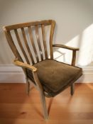 A continental beech elbow chair.