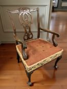 An early 20th century mahogany Chippendale style open armchair,