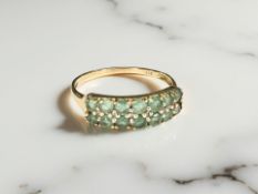 A 9ct gold emerald ring, size P CONDITION REPORT: 1.