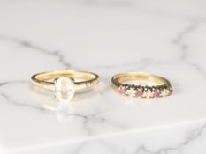 A 10ct gold solitaire dress ring, size R, plus a further ruby-set ring, unmarked.