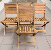 A set of four folding teak garden chairs