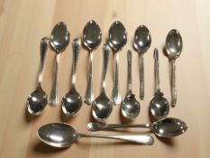 Twelve various silver teaspoons. CONDITION REPORT: 157g gross.
