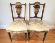 A pair of late Victorian satinwood inlaid occasional chairs