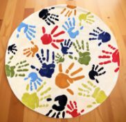 A brand new children's hand prints pattern circular rug, diameter 150 cm.
