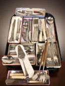 A collection of stainless steel cutlery.