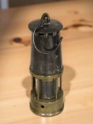 A 19th century brass and steel miner's safety lamp