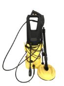 A Karcher pressure washer.