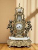 A reproduction gilt brass and marble mantel clock, the enameled dial signed 'Imperial',