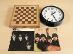 Two The Beatles vinyl LP records, medieval resin chess set with board,