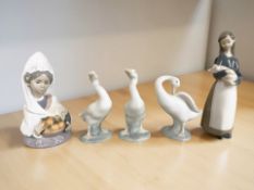 Two Lladro figures of girls and three further geese