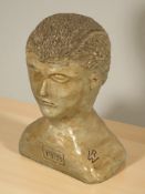 A pottery bust of a man, signed RW and dated 1989, height 14 cm.