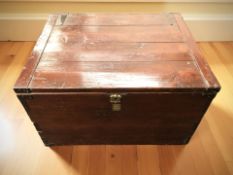 A stained pine metal bound trunk,