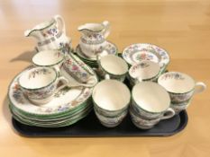 Approximately fifty pieces of Copeland Spode Chinese Rose tea china.