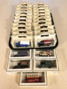 A collection of Days Gone die cast delivery vans, buses, etc.