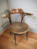 An early 20th century bentwood elbow chair