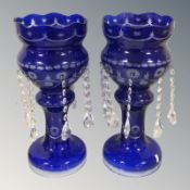 A pair of two tone glass table lustres, height 37 cm.