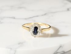 A 9ct gold sapphire and diamond ring, size Q CONDITION REPORT: 1.