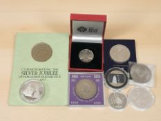 A small group of British coins including five pound coins, Churchill crown, etc.