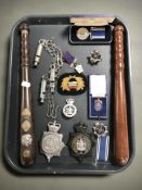 A group of police effects including two turned wooden truncheons,