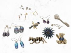 A group of enamelled costume brooches and other jewellery, pair of 9ct gold and pearl earrings,