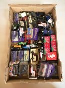 A group of boxed and unboxed die cast vehicles, delivery vans, etc, including Corgi and Matchbox.