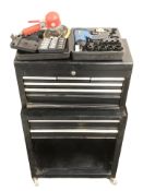 An enamelled tool chest of castors containing a work zone socket drill, socket set etc,