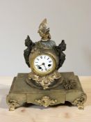 An onyx and gilt metal mantel clock, height 36 cm.