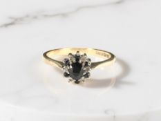 A 9ct gold sapphire and diamond ring, size M CONDITION REPORT: 1.