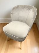 A contemporary occasional chair in grey suede effect fabric