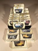 A collection of Matchbox Models of Yesteryear boxed die cast delivery vans, classic cars, etc.