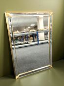 A contemporary gilt and bevelled mirror 101 cm x 71 cm