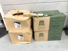 A large quantity of Christmas crackers and plastic lids