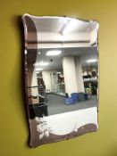 An Art Deco frameless two-tone etched mirror,