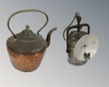 A Victorian copper kettle and a Premier lamp, height 25 cm.