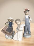 Three Lladro figures including angel musician,