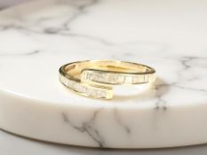 A 9ct gold crossover ring, size R CONDITION REPORT: 1.