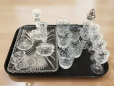 A group of crystal drinking glasses, pair of candlesticks, dressing table tray, etc.