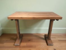 Three modern stained pine high topped restaurant / bar tables,