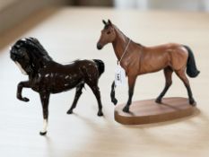 A Royal Doulton matte glazed figure of a horse on plinth,