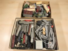 A collection of rolling stock including Hornby Dublo and Tri-Ang, railway buildings, track, etc.