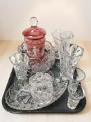 A contemporary Mary Gregory style cranberry glass jar and cover,