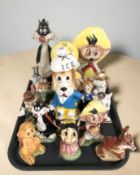 A group of Italian Warner Brothers character decanters, some retaining contents.