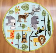 A brand new children's wildlife patterned circular rug, diameter 150 cm.