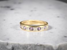 A 9ct gold amethyst and diamond ring, size O CONDITION REPORT: 1.