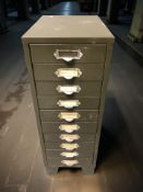 An enameled ten drawer index chest, width 28 cm.