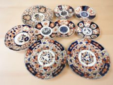 Nine various Japanese Meiji period imari export plates, largest 31 cm diameter.