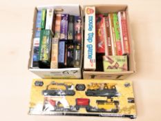 A collection of board games, puzzles, Cat train set,